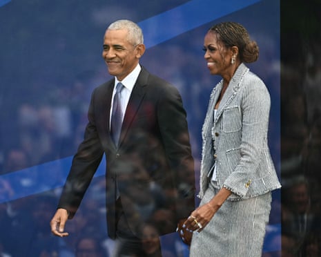 Fomer US president Barack Obama and his wife Michelle Obama arrive at the opening of the Obama Presidential Center in Chicago.