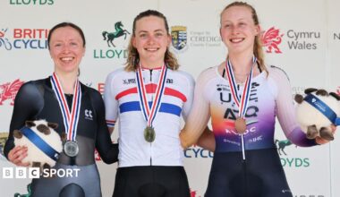 Anna Morris, Zoe Backstedt & Elynor Backstedt on the podium with medals