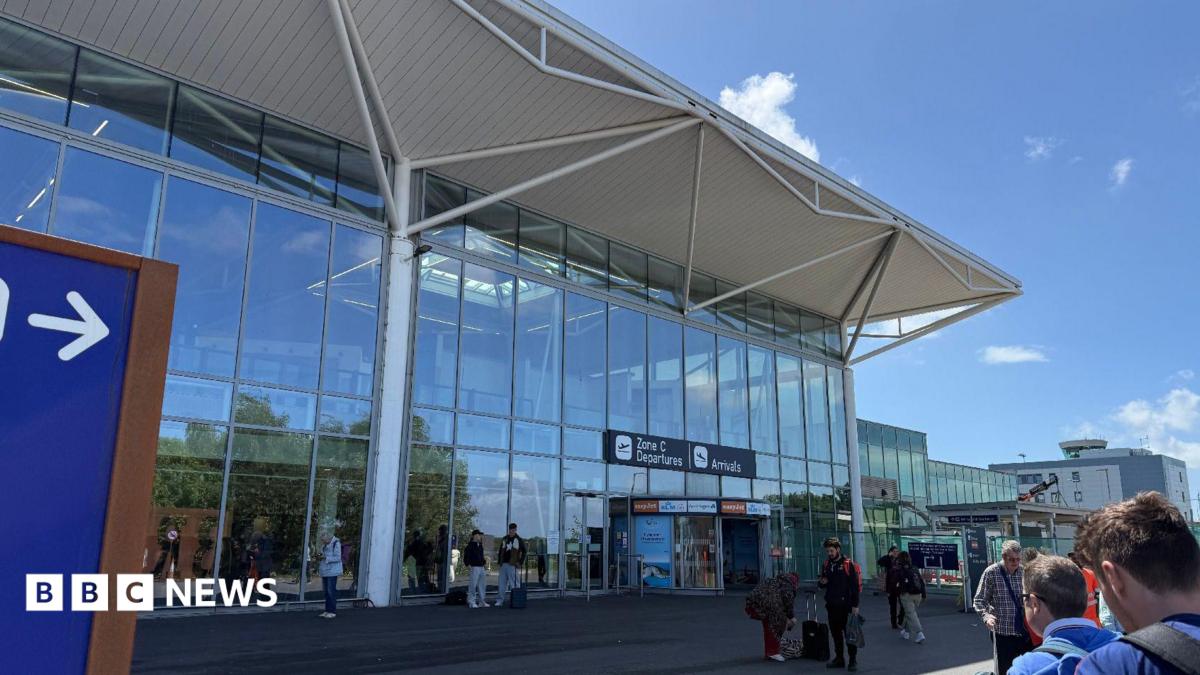 The entrance to the departure lounge at Bristol Airport on a sunny day