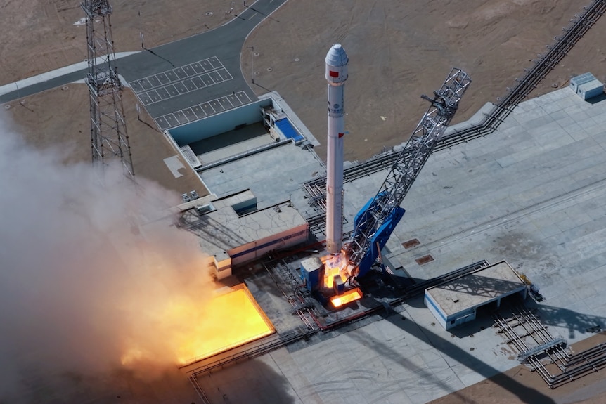 Rocket igniting and taking off