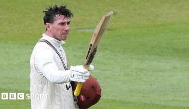 Surrey's Dan Lawrence celebrates scoring his century against Hampshire at The Kia Oval