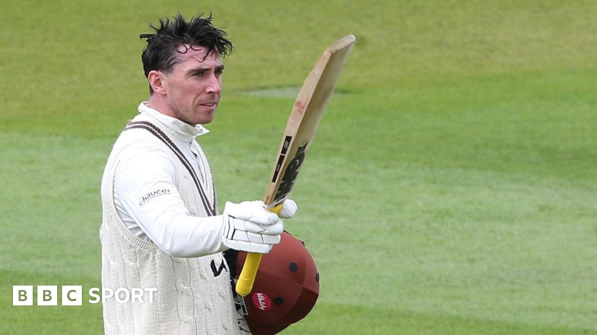 Surrey's Dan Lawrence celebrates scoring his century against Hampshire at The Kia Oval
