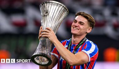 Justin Devenny with the Uefa Conference League trophy