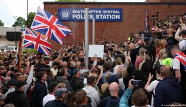 UK: 6 more charged after violent protest over stabbing death