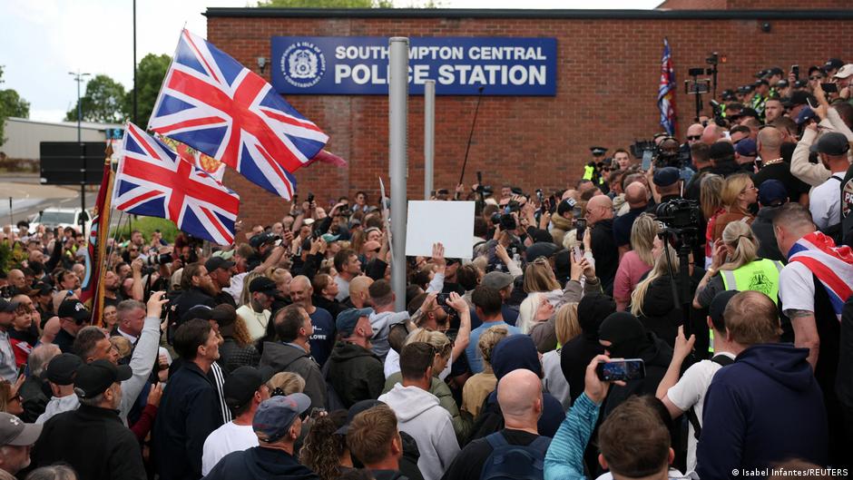 UK: 6 more charged after violent protest over stabbing death