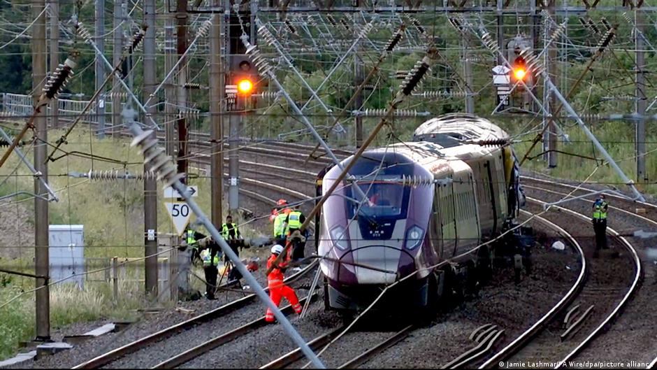 Train collision north of London kills at least one person