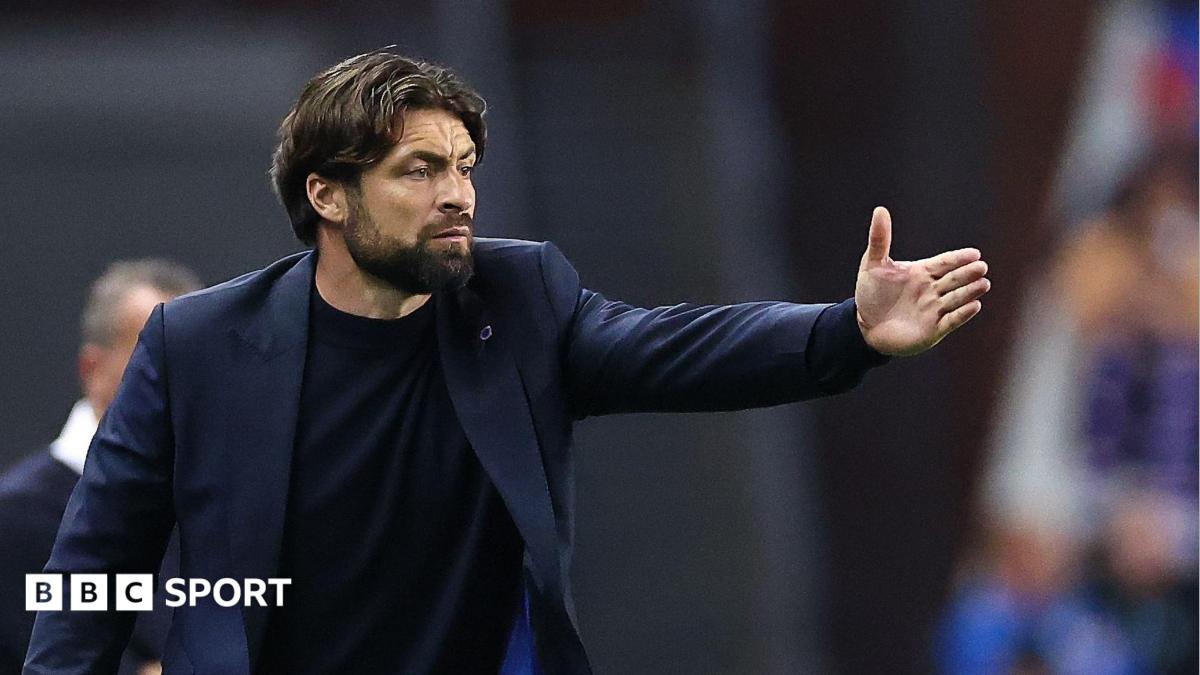 Russell Martin points directions to his Rangers players during a Champions League play-off game