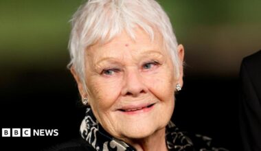 Dame Judi Dench, an ageing women with short, white hair