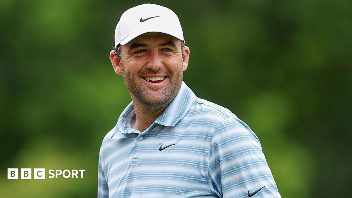 Scottie Scheffler smiles during the second round of the Travelers Championship in 2026