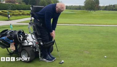 Alistair Bonham in action, using a Paragolfer - a device which allows users with lower limb disabilities to adopt a standing position in order to freely swing a golf club - at Lytham Green Drive Golf Club