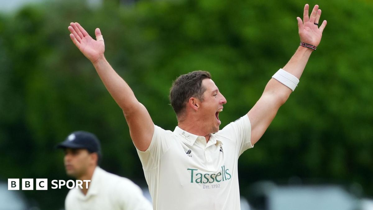 Kent's Keith Dudgeon, in whites, appeals to the right of shot, to an unpictured umpire