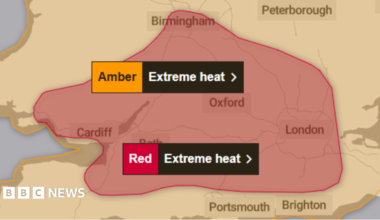 A map of the UK where a red section fills the map to detail where extreme weather will be felt during a particular time. There is an orange section that shows a slightly less serious weather warning.