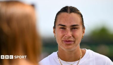 Aryna Sabalenka talks to the media