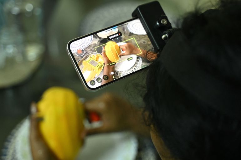 The Indian workers training AI robots to take their jobs