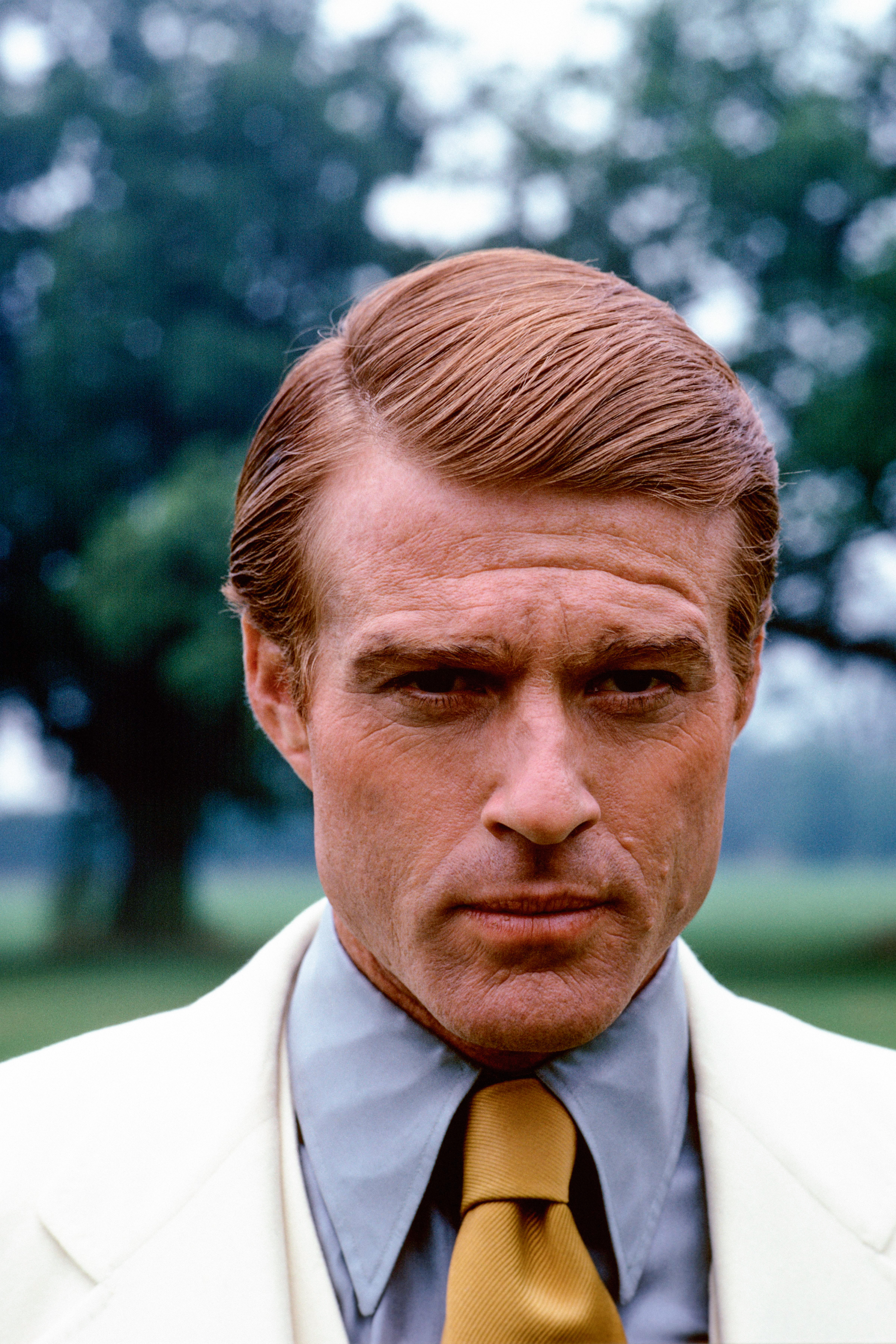 UNITED STATES - DECEMBER 01: On the set for The Great Gatsby, Robert Redford as Gatsby in a 1920s tuxedo with knit vest and tails. (Photo by Duane Michals/Conde Nast via Getty Images)