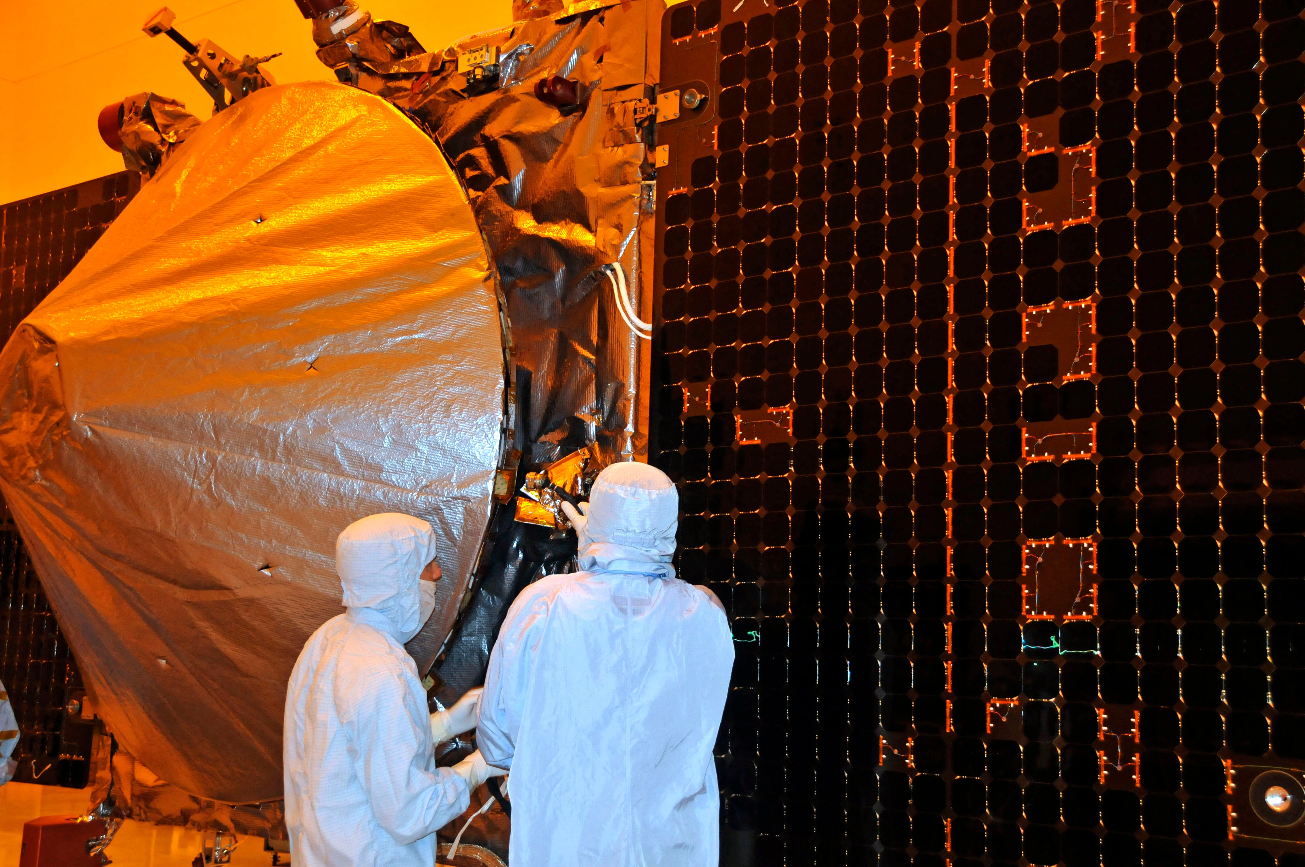 Maven is checked by technicians in preparation for launch at the Kennedy Space Center, Florida on Sept. 27, 2013