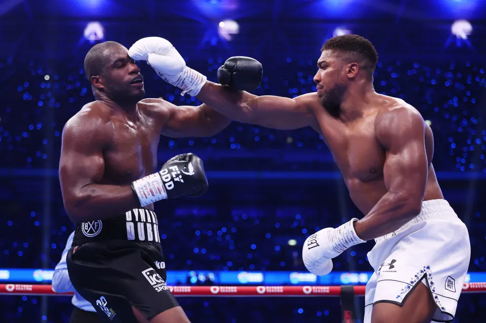 Anthony Joshua landing a jab on Daniel Dubois