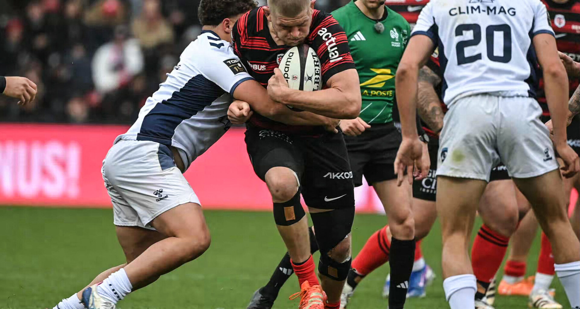 Jack Willis of Toulouse runs into a tackle during his team's March 2026 Top 14 match against Montpellier