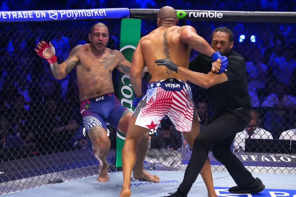 WASHINGTON, DC - JUNE 14: Ciryl Gane of France knocks down Alex Pereira of Brazil in the UFC interim heavyweight championship fight during the UFC Freedom 250 event on the South Lawn at the White House on June 14, 2026 in Washington, DC. (Photo by Jeff Bottari/Zuffa LLC)