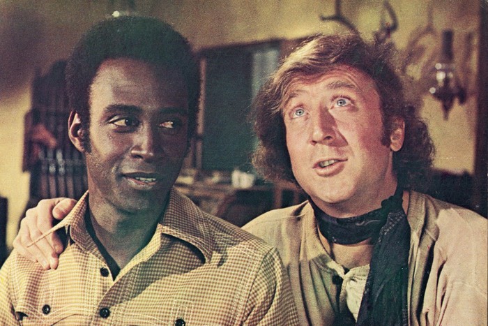 Gene Wilder with his arm around the shoulder of Cleavon Little in Blazing Saddles.