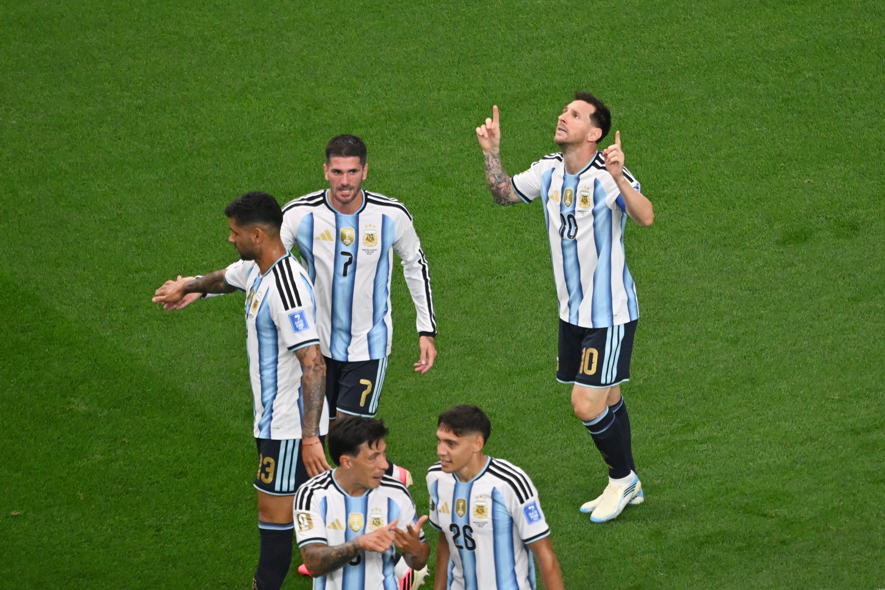 Lionel Messi celebrates scoring against Austria