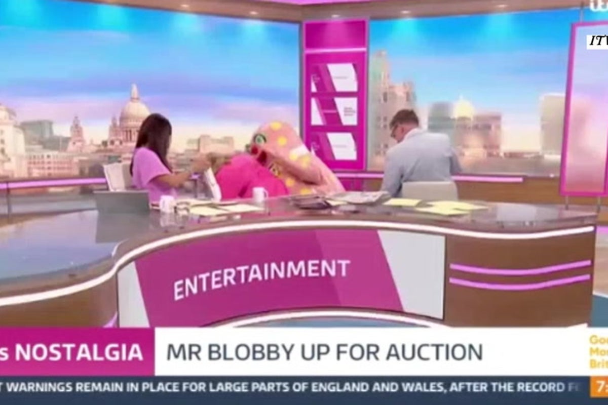 Kate Garraway knocked off chair live on tv by Mr Blobby - The Independent
