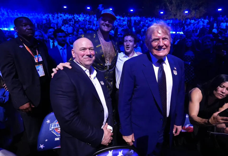 UFC president Dana White poses with boxer Tyson Fury and US President Donald Trump