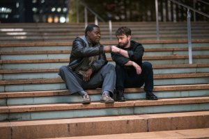 THE FALL AND RISE OF REGGIE DINKINS stars Tracy Morgan as Reggie Dinkins, Daniel Radcliffe as Arthur Tobin