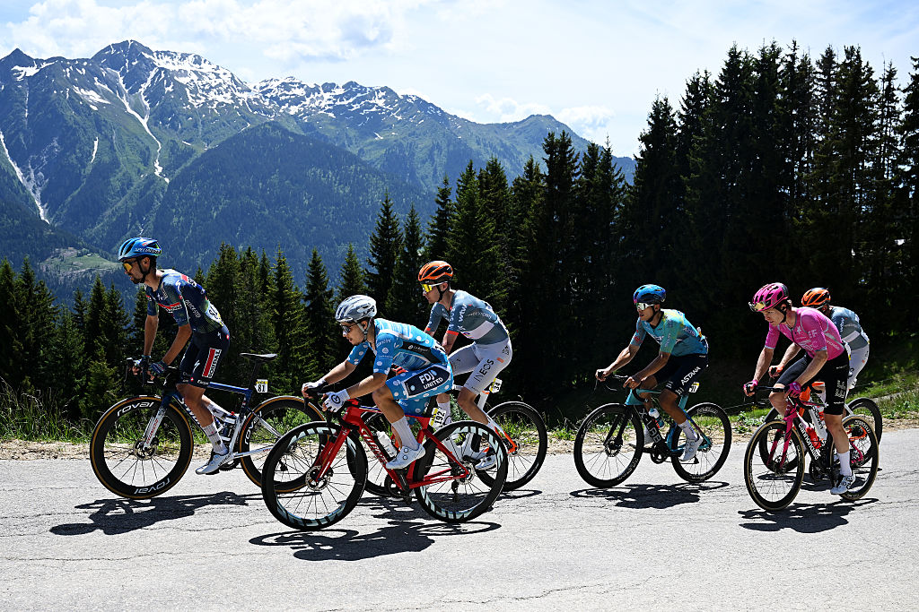 BRISON, FRANCE - JUNE 14: (L-R) Valentin Paret-Peintre of France and Team Soudal Quick-Step, Clement Braz Afonso of France and Team Groupama - FDJ United - Polka dot Mountain Jersey, Carlos Rodriguez of Spain and Netcompany INEOS Cycling Team, Harold Tejada of Colombia and Team XDS Astana, Georg Steinhauser of Germany and Team EF Education - EasyPost and Laurens De Plus of Belgium and Netcompany INEOS Cycling Team compete in the breakaway climbing to the Montee de Bisanne (1724m) during the 78th Tour Auvergne-Rhone-Alpes 2026, Stage 8 a 120.1km stage from Beaufort to Plateau de Solaison - Brison 1497m / #UCIWT / on June 14, 2026 in Brison, France. (Photo by Dario Belingheri/Getty Images)