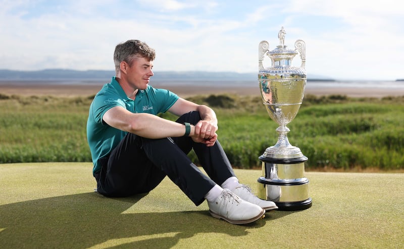 Stuart Grehan with the Amateur Championshiptrophy.