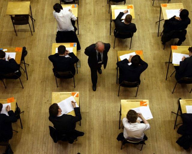 File photo dated 07/03/12 of a general view of pupils sitting an exam. Anonymously marked exam papers are still the best way of guaranteeing consistent standards in Scottish schools, a group of experts says. The future of the exams system is in question following the decision to scrap the last two exam diets due to the pandemic. Issue date: Monday August 9, 2021. PA Photo. See PA story SCOTLAND Exams. Photo credit should read: David Jones/PA Wire