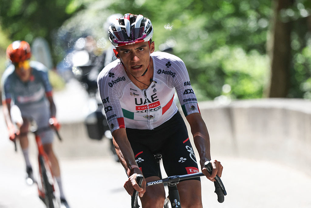 UAE Team Emirates XRG's Mexican rider Isaac Del Toro Romero cycles in a breakaway during the 8th and final stage of the Tour Auvergne-Rhone-Alpes cycling race (formerly known as the Criterium du Dauphine), 120,1km between Beaufort and Plateau de Solaison, in the French Alps on June 14, 2026. (Photo by Anne-Christine POUJOULAT / AFP)