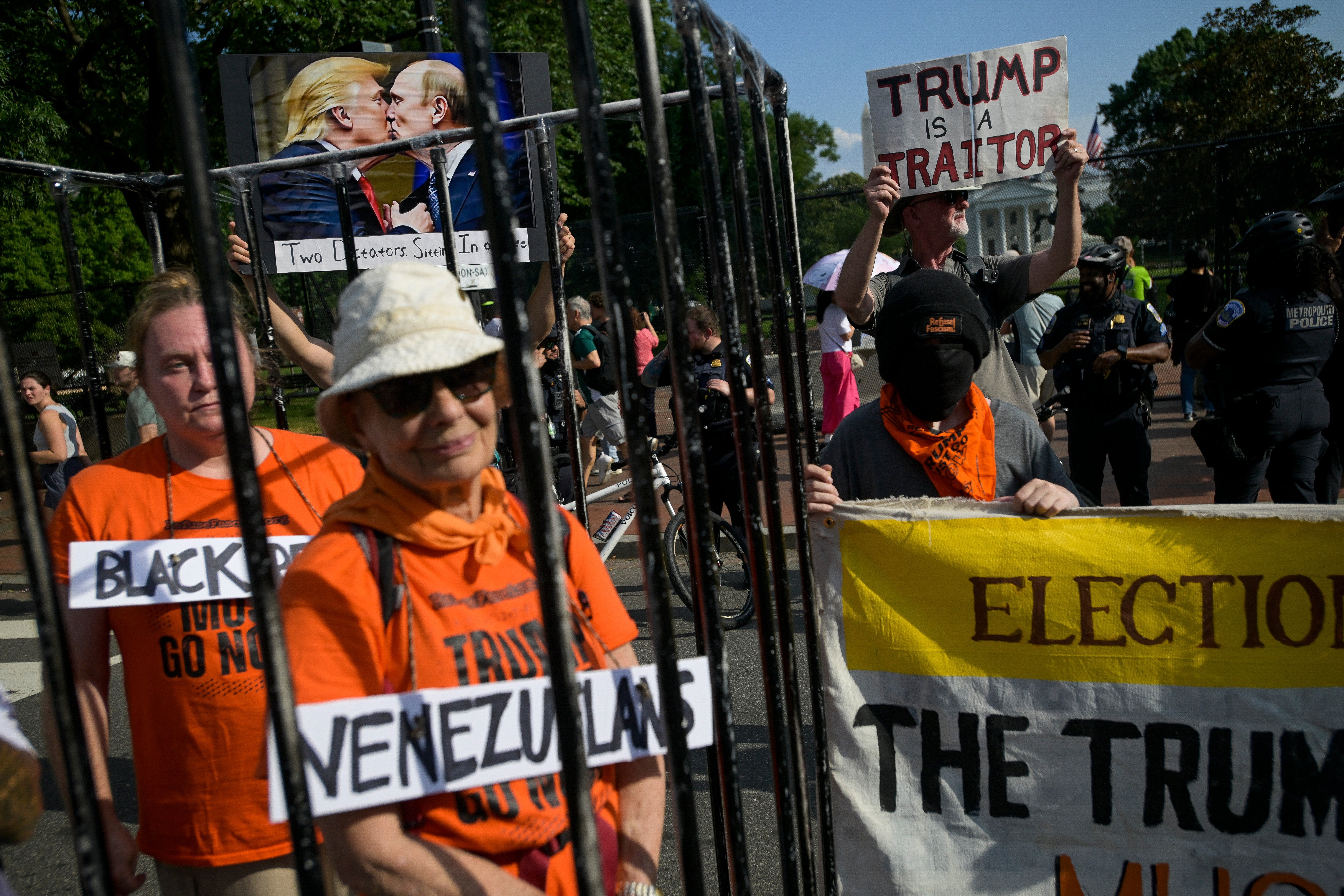 Protesters gathered near the White House Sunday afternoon to protest the Trump administration