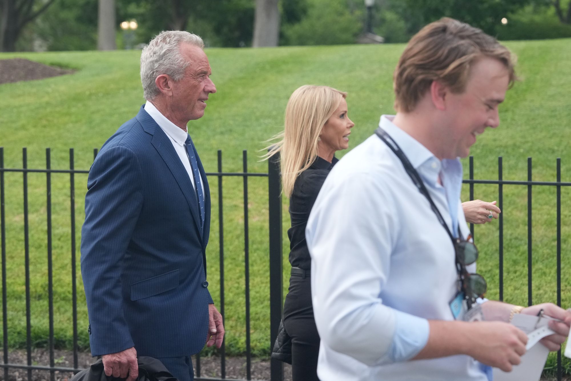 Health and Human Services Secretary Robert F. Kennedy Jr. makes his way to the White House on Sunday afternoon