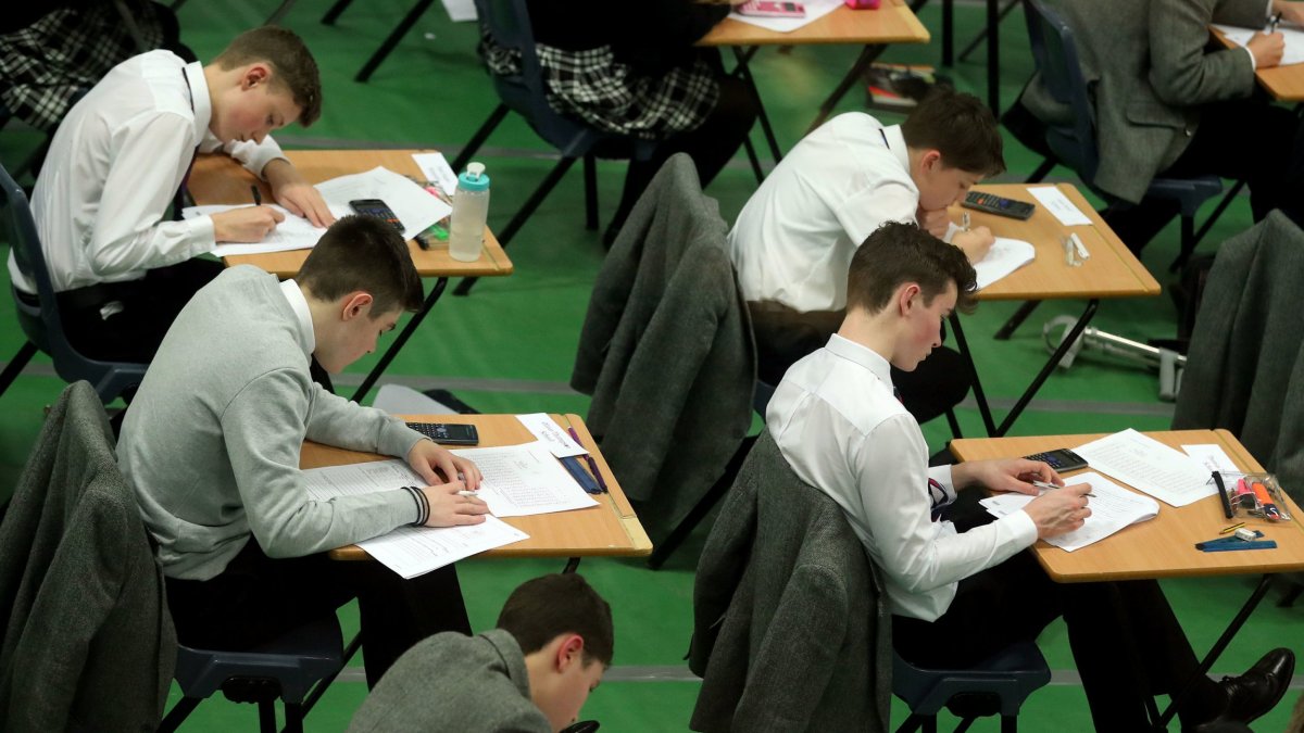 Undated file photo of students sitting an exam, as a survey by the Association of School and College Leaders found that nearly 80% of schools and colleges had more requests than pre-pandemic for pupils to take their exams in separate rooms away from the exam hall because of anxiety and stress. PA Photo. Issue date: Wednesday May 11, 2022. In the poll of 527 headteachers at schools in England, Wales and Northern Ireland, heads reported that exam anxiety was causing high rates of pupil absence. See PA story EDUCATION Exams. Photo credit should read: Gareth Fuller/PA Wire