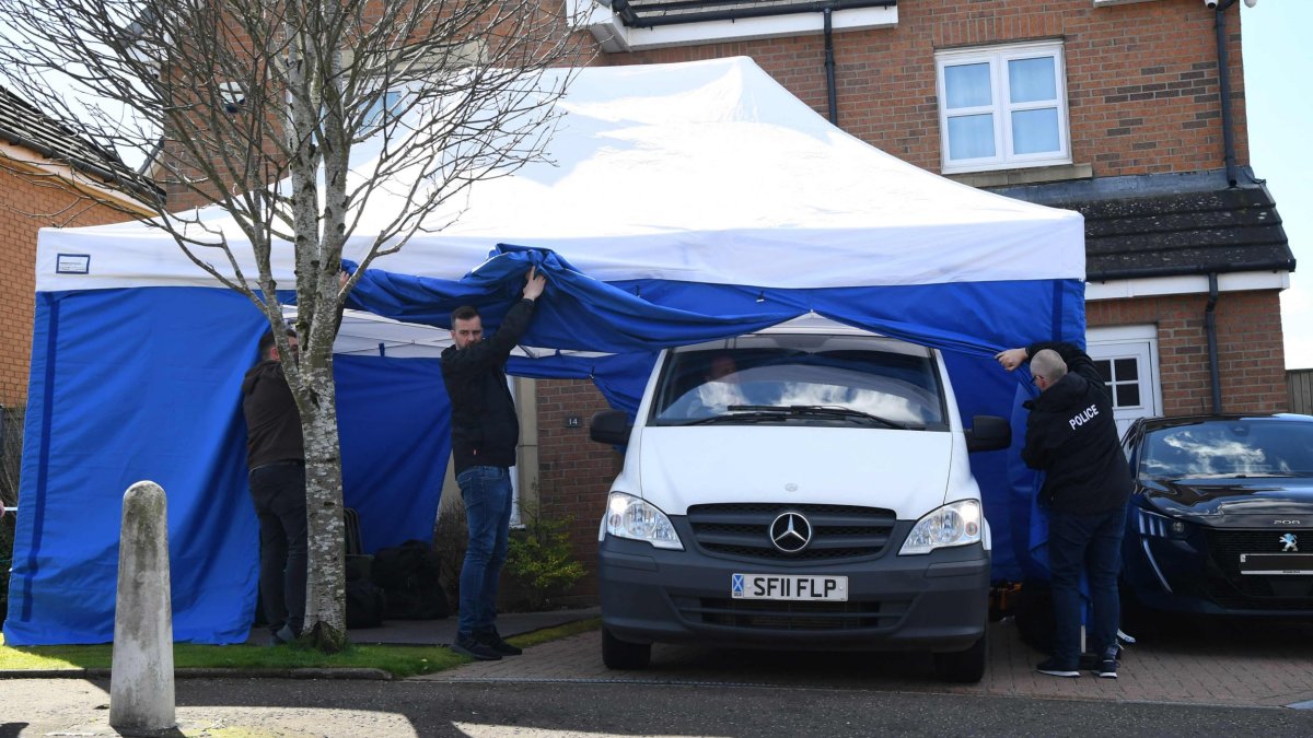 A police vehicle drives away from the home of Peter Murrell, former chief executive of the Scottish National Party (SNP), and his wife, Scotland's former First Minister and former leader of the SNP, Nicola Sturgeon, in Glasgow on April 6, 2023. - Police in Scotland on Wednesday released the husband of former Scottish leader Nicola Sturgeon after he was arrested as part of an investigation into financial irregularities, sending shockwaves through Scotland's ruling party. (Photo by ANDY BUCHANAN / AFP) (Photo by ANDY BUCHANAN/AFP via Getty Images)