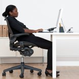 Incorrect seated posture.