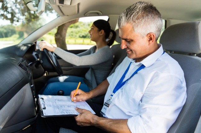 handsome senior driving instructor testing learner driver; Shutterstock ID 364522199; purchase_order: -; job: -; client: -; other: -