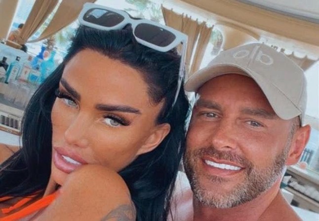 Katie Price and Lee Andrews take a selfie together at a beach club.