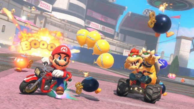 Mario Kart World gameplay of Mario and Bowser driving go karts in the Bob-omb Blast mode