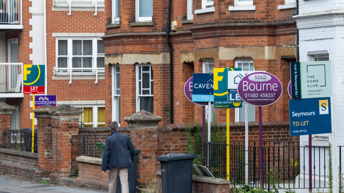 Estate agents 'for sale' and 'let' signs outside residential properties in Guildford, UK, on Monday, July 28, 2025. The number of UK home loans given the green light rose to a three-month high in June, as the housing market continued to shake off the impact of April's tax hike.??Photographer: Jason Alden/Bloomberg via Getty Images
