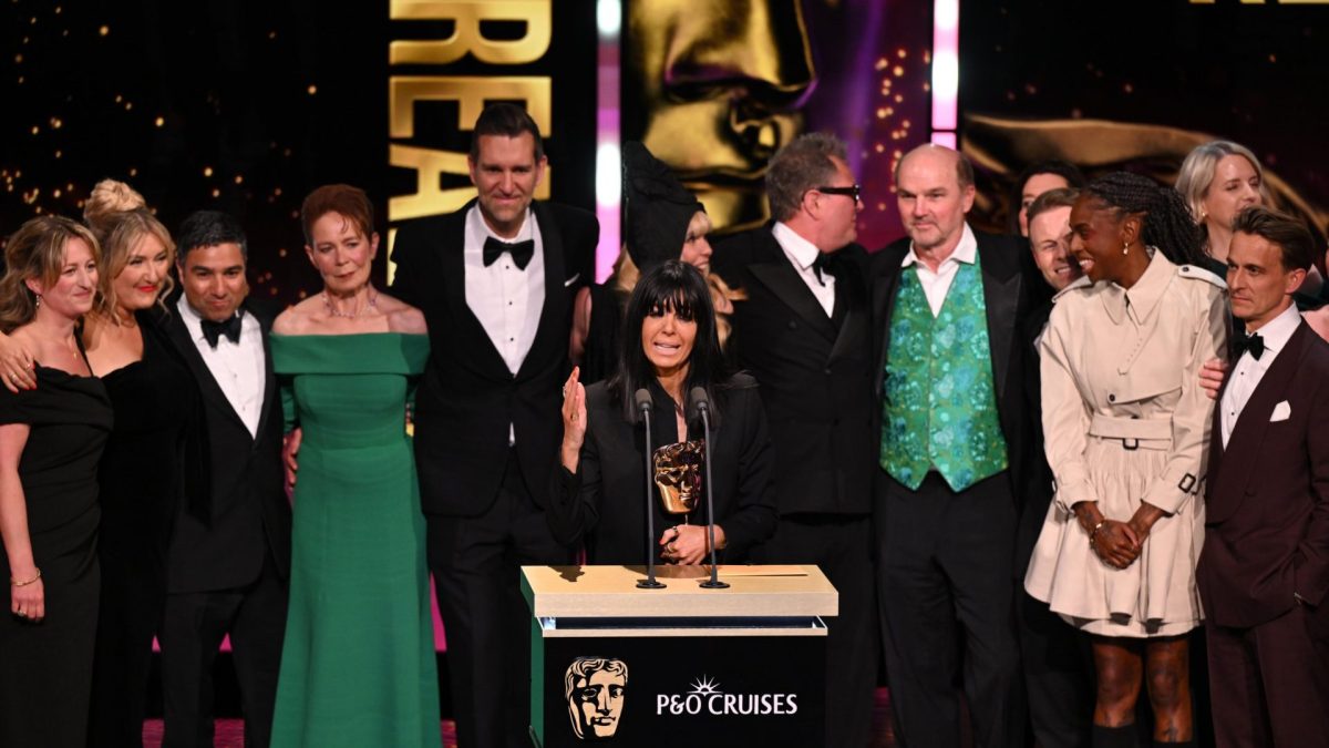 LONDON, ENGLAND - MAY 10: Katy Fox, Sarah Fay, Nick Mohammed, Celia Imrie, Mike Cotton, Claudia Winkleman, Paloma Faith, Alan Carr, Stephen Lambert, Lewis Thurlow, Cat Burns and Ben Archard accept the Reality Award for 'The Celebrity Traitors' onstage during the 2026 BAFTA Television Awards with P&O Cruises at The Royal Festival Hall on May 10, 2026 in London, England. (Photo by Jeff Spicer/BAFTA/Getty Images for BAFTA)
