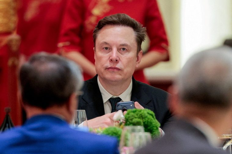 Tesla CEO Elon Musk arrives to attend a state banquet with US President Donald Trump and Chinese President Xi Jinping at the Great Hall of the People in Beijing. (Picture: Evan Vucci/Reuters)