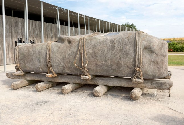 Replica of giant stone megalith on wooden rollers Stonehenge, Wiltshire, England, UK. (Photo by: Geography Photos/Universal Images Group via Getty Images)