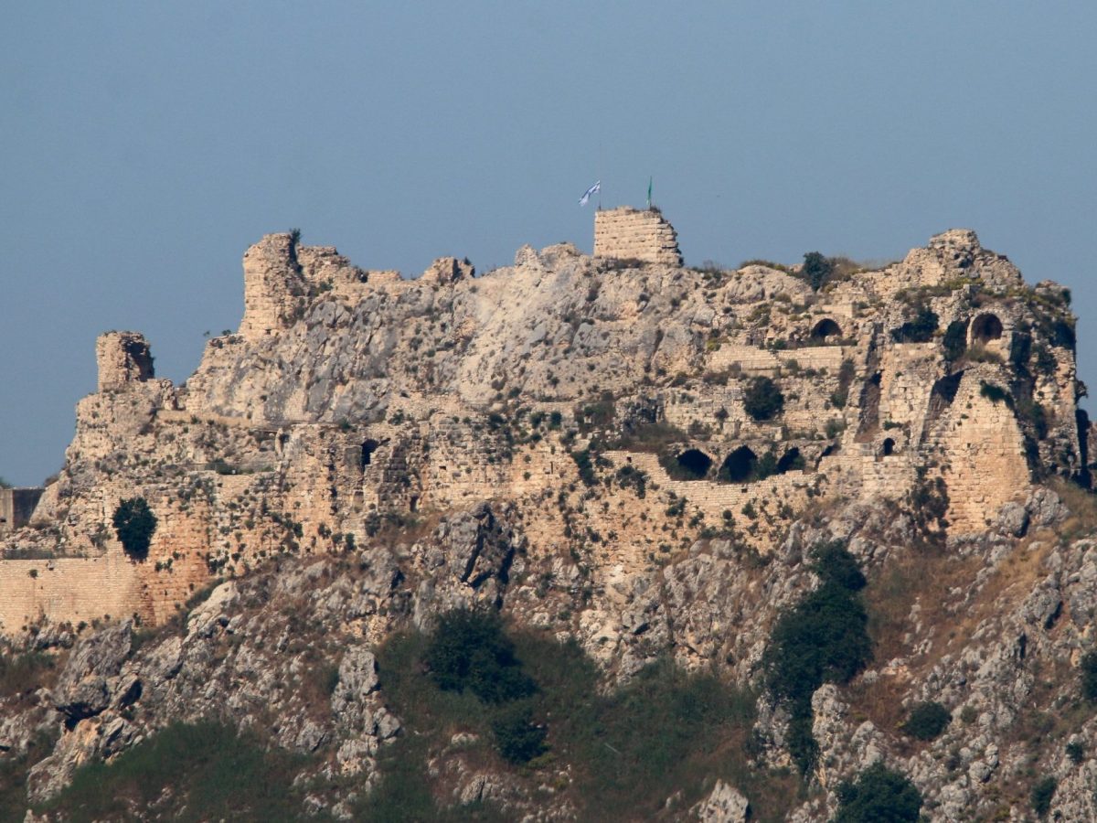 An Israeli flag and a flag of the Golani Brigade fly on Beaufort Castle, as seen from Marjayoun, southern Lebanon, June 1, 2026. REUTERS/Stringer