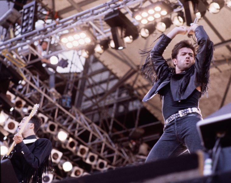 Andrew Ridgeley and George Michael of Wham! perform on stage at 'The Final Concert', Wembley Stadium, London, 28th June 1986. (Photo by Michael Putland/Getty Images)