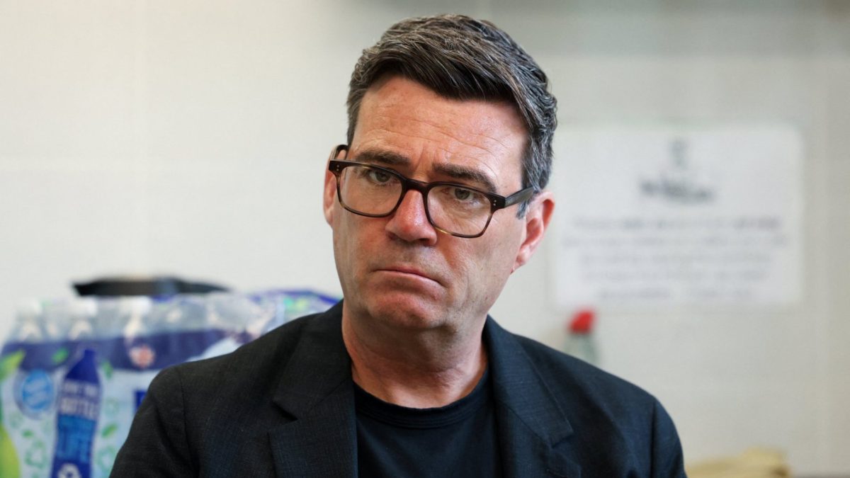 Greater Manchester Mayor and Labour candidate Andy Burnham looks on as he meets residents impacted by flooding in the Makerfield constituency, where he is a candidate in the by-election, at the Platt Bridge Community Centre in Wigan, Britain, June 2, 2026 REUTERS/Temilade Adelaja