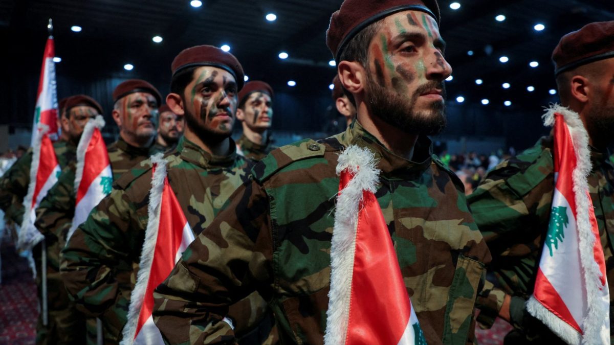 FILE PHOTO: Hezbollah members parade during a rally marking al-Quds Day, (Jerusalem Day) in Beirut's southern suburbs, Lebanon April 5, 2024. REUTERS/Mohamed Azakir/File Photo