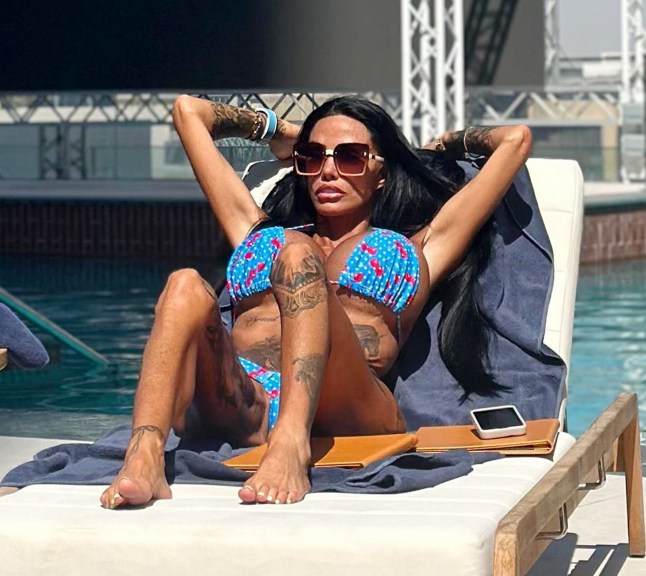 BGUK_3600866 - *PREMIUM-EXCLUSIVE* DUBAI, UNITED ARAB EMIRATES MUST CALL FOR PRICING BEFORE USAGE - Former Glamour model and reality TV star Katie Price looks carefree as she soaked up the sunshine in Dubai. The model was seen wearing a striking blue cherry-print bikini while enjoying some downtime in the UAE. The television personality appeared in good spirits as she lounged poolside, topping up her tan and taking a break from the ongoing personal drama that has recently dominated headlines. Katie's return to Dubai comes shortly after she publicly broke her silence over a deeply personal relationship situation, revealing details of an emotional and desperate effort to help free her husband, Lee Andrews from Dubai. Speaking candidly, the star described a whirlwind trip involving visits to a court, jail and police station as she attempted to secure his release, sharing the stress and uncertainty she faced during the ordeal. The latest getaway also arrives amid growing speculation surrounding the couple's relationship. Recent reports have highlighted a mystery after Lee Andrews reportedly unfollowed Katie on Instagram, sparking widespread discussion among fans and followers. The social media development comes as Katie herself has recently returned to the platform following a ban, placing the pair's online activity firmly under the spotlight. Despite the ongoing rumours and media attention, Katie appeared determined to enjoy a moment of relaxation under the Dubai sun, cutting a glamorous figure in her eye-catching swimwear as she unwound by the pool. With questions continuing to swirl around her personal life, the star's latest appearance is sure to keep fans talking as they await further updates on both her relationship status and the circumstances surrounding the recent headlines. Pictured: Katie Price - Jordan BACKGRID UK 3 JUNE 2026 UK: +44 208 344 2007 / uksales@backgrid.com USA: +1 310 798 9111 / usasales@backgrid.com *Pictures Containing Children Please Pixelate Face Prior To Publication*