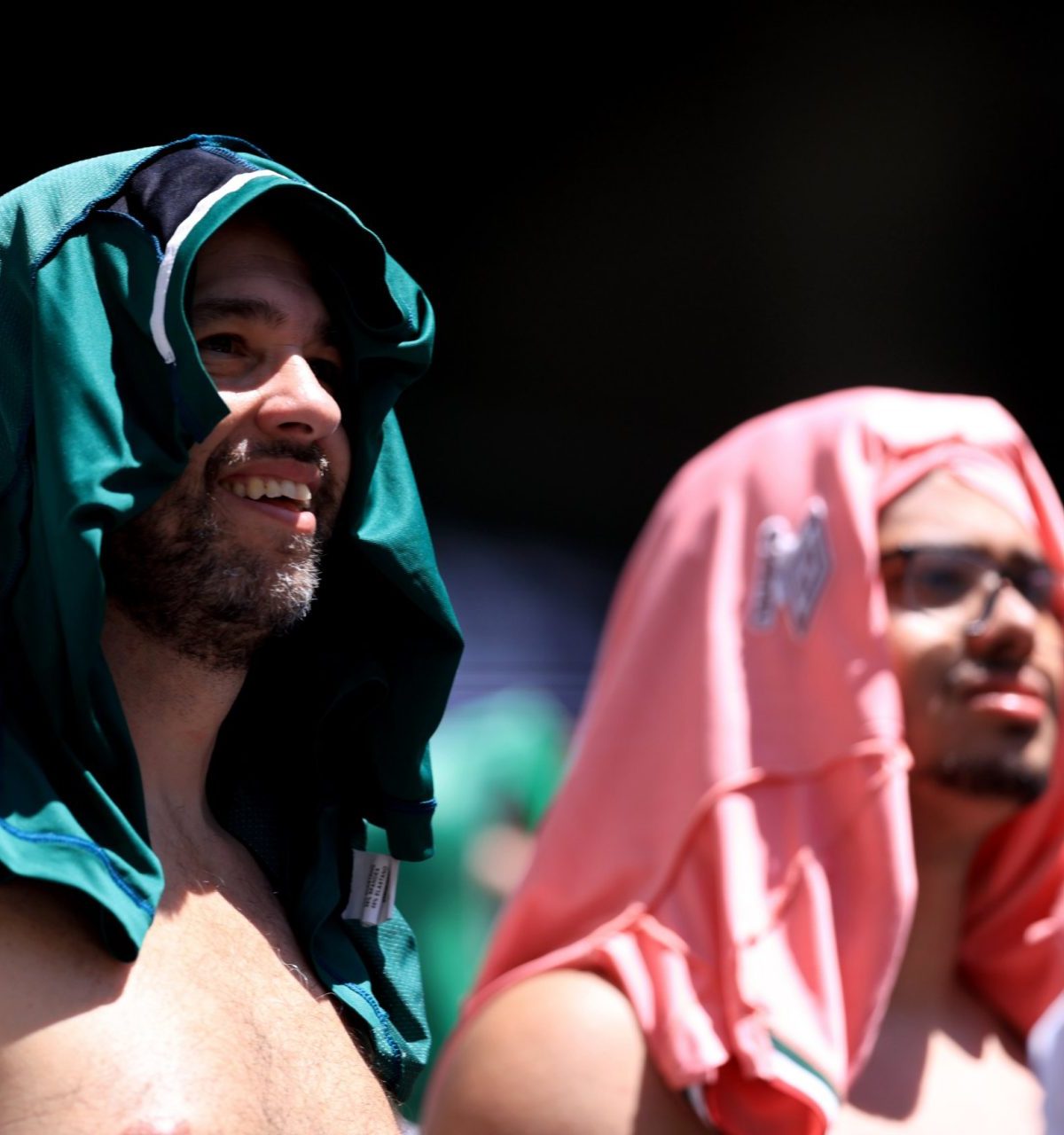 MIAMI GARDENS, FLORIDA - JUNE 25: Fans of Fluminese with shirts on the head during the heat during the FIFA Club World Cup 2025 group F match between Mamelodi Sundowns FC and Fluminense FC at Hard Rock Stadium on June 25, 2025 in Miami Gardens, Florida. (Photo by Catherine Ivill - AMA/Getty Images)
